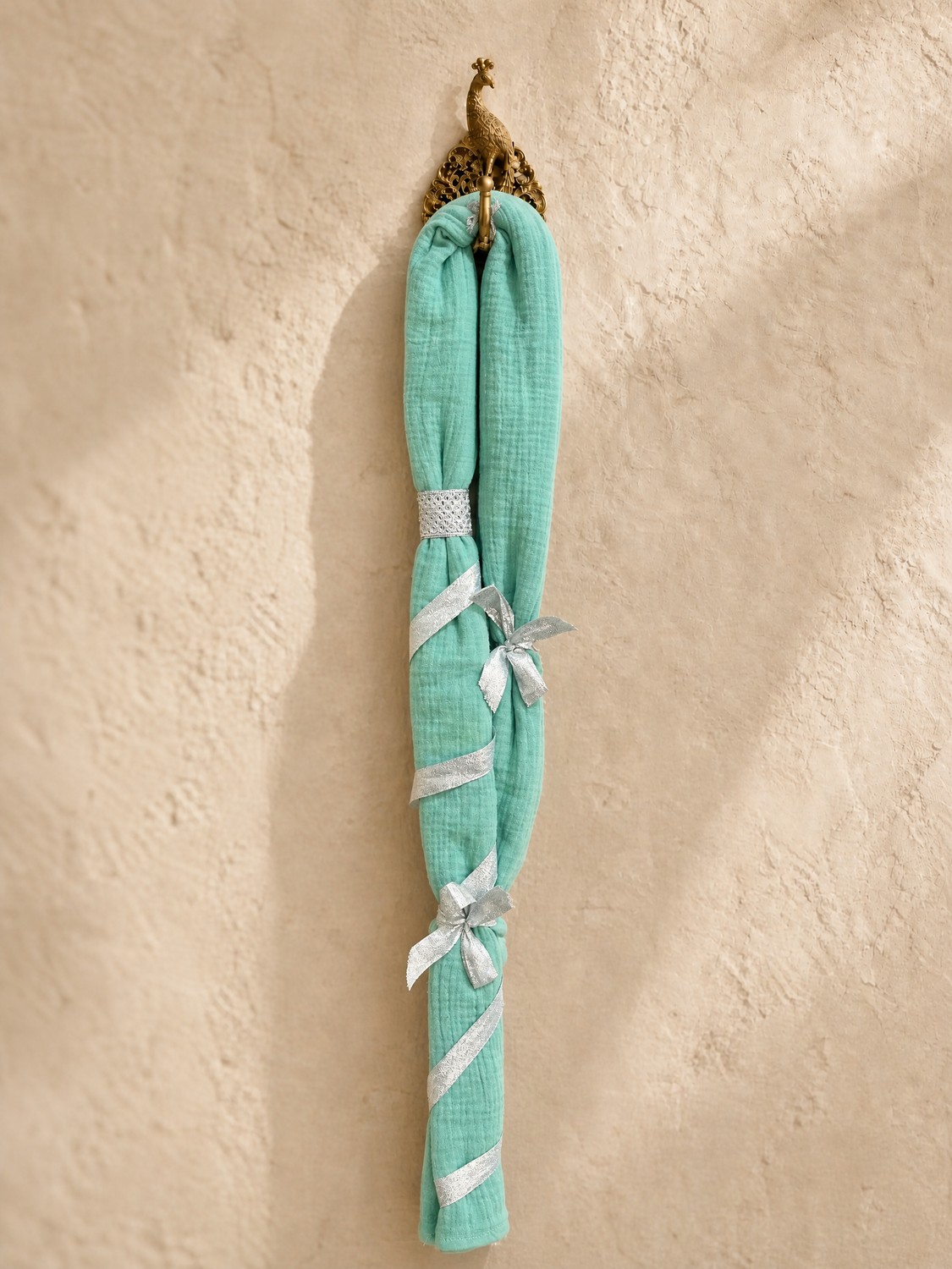 The Tharang Maala — mint green cotton muslin garland