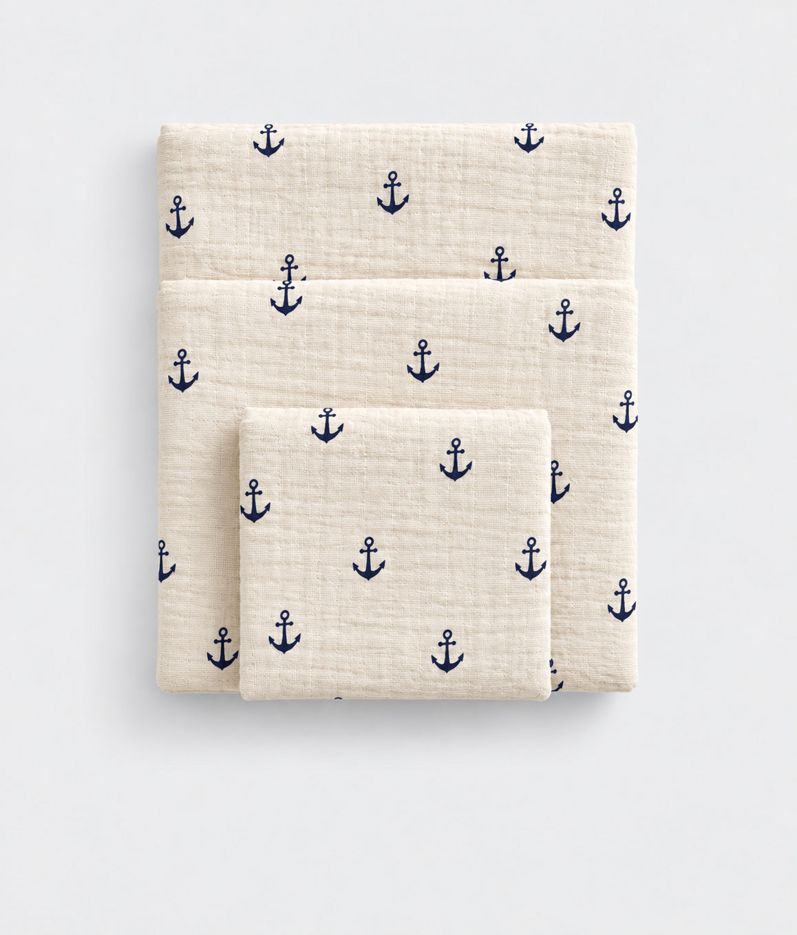 Deep Sea cotton muslin towel, folded, anchor print