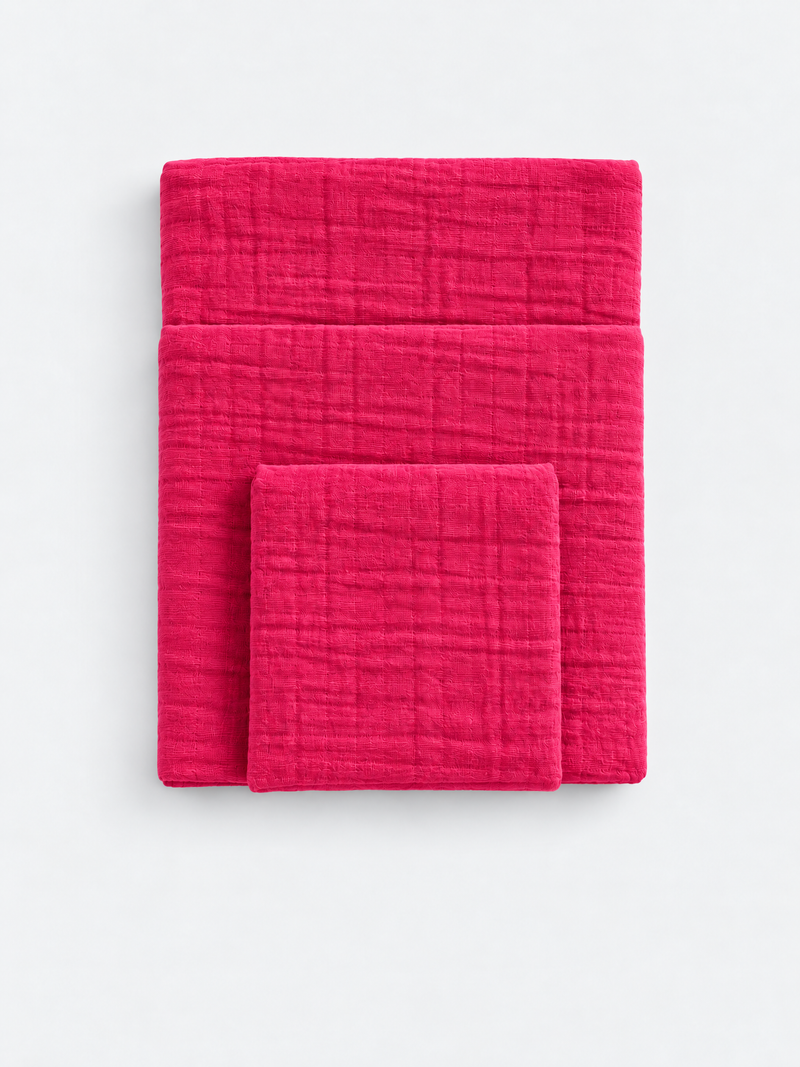 Raspberry Soda cotton muslin towel, folded flat lay, White Flowerr