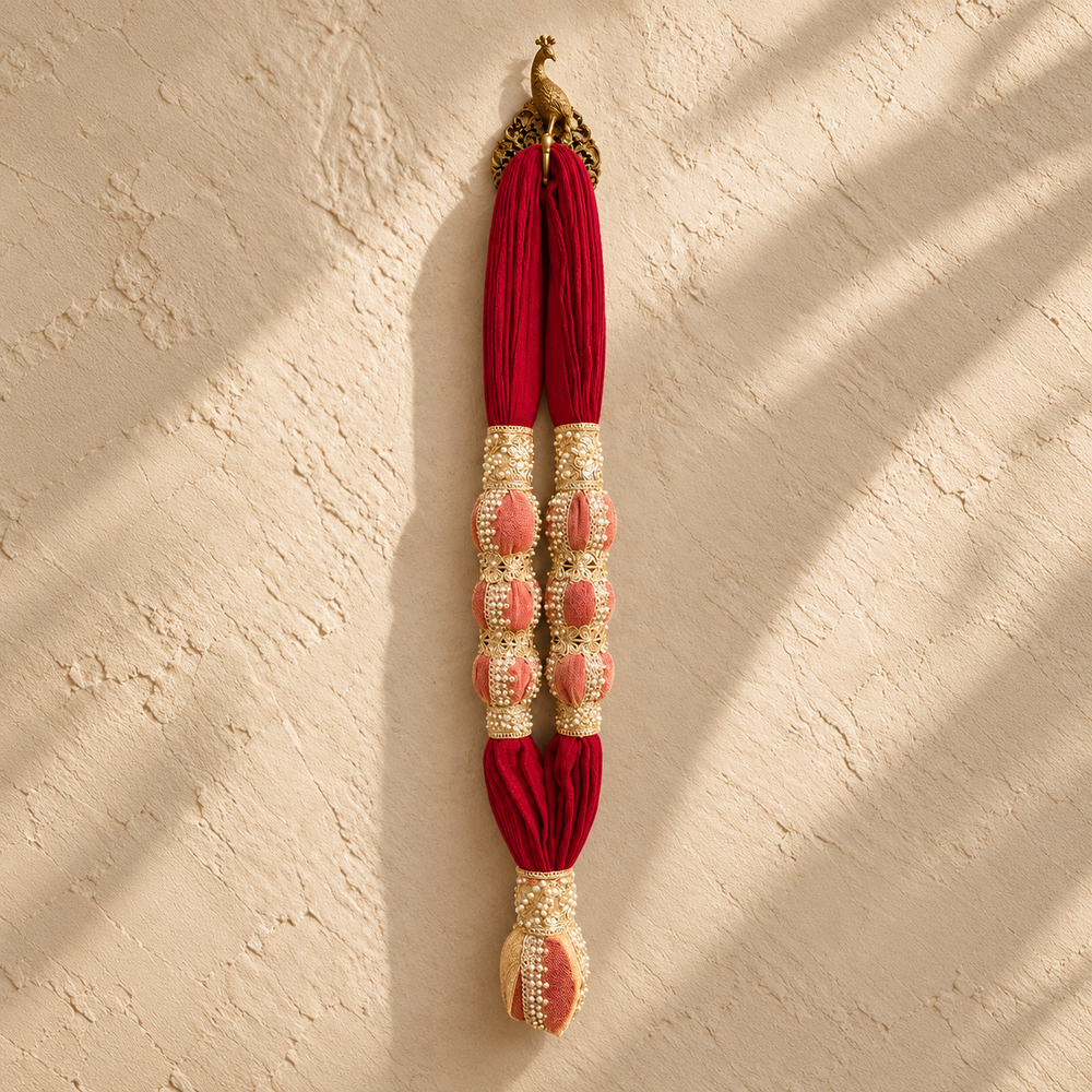 VVIP Maala, red cotton muslin garland with three decorated towel balls on each side