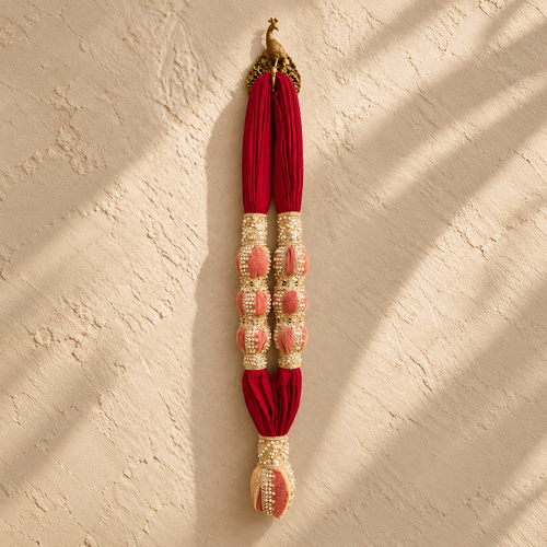 VVIP Maala, red cotton muslin garland with three decorated towel balls on each side