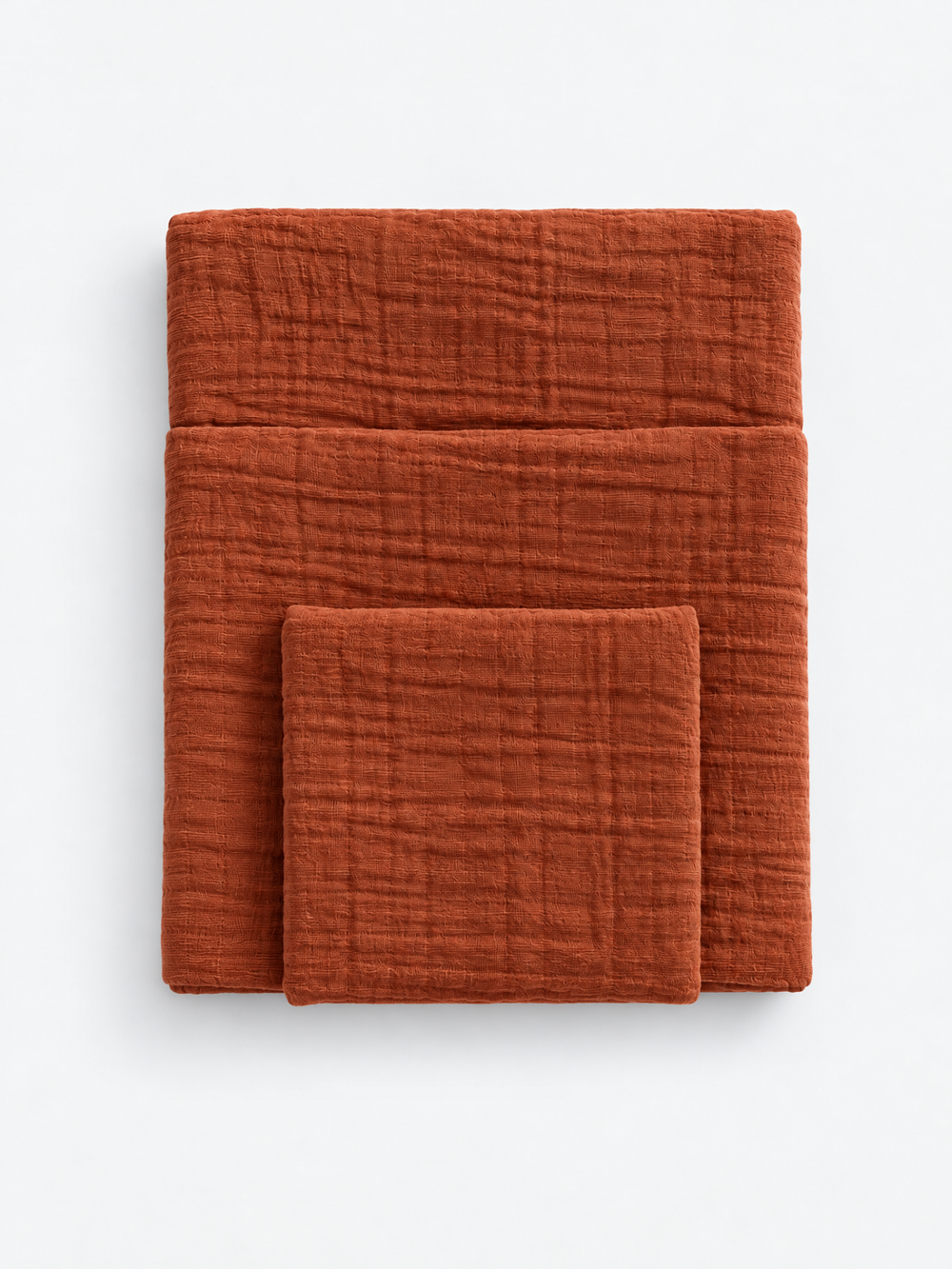 Iced Coffee cotton muslin towel colour reference by White Flowerr, showing folded towels in different sizes