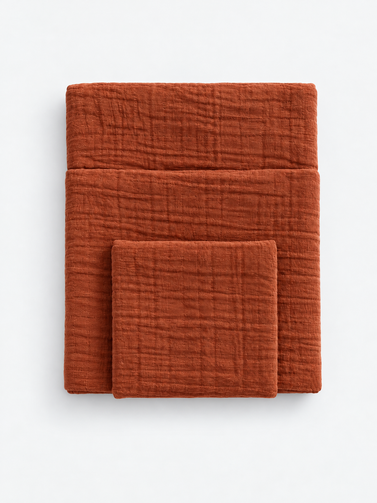 Iced Coffee cotton muslin towel colour reference by White Flowerr, showing folded towels in different sizes